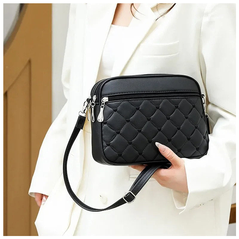 The Erica Silver-Tone Vegan Leather Crossbody Bag