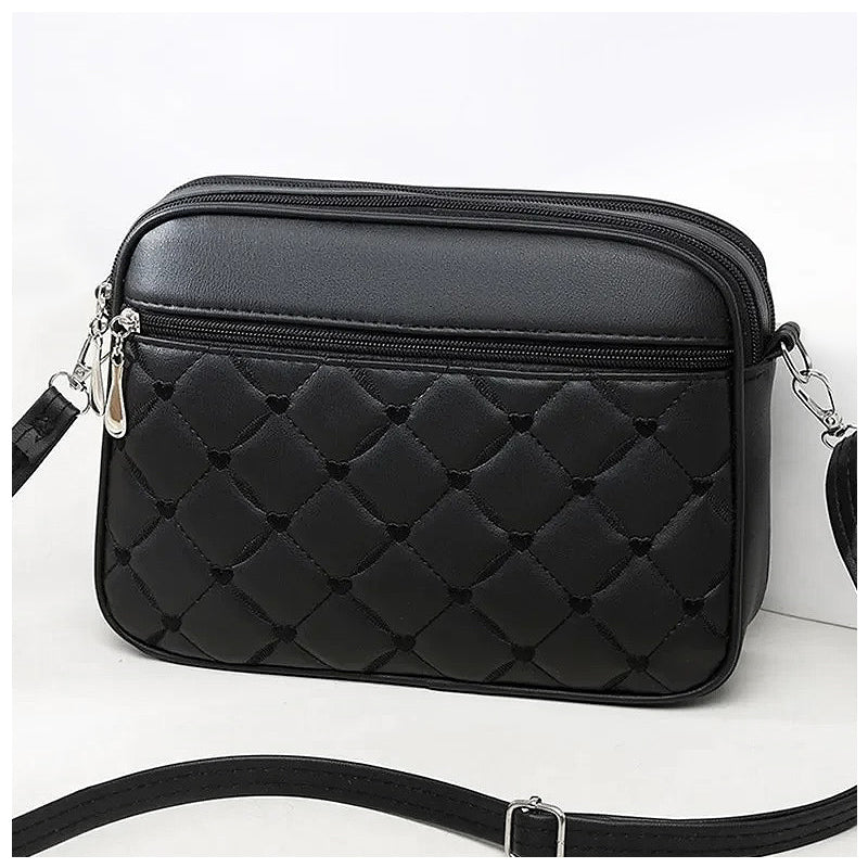 The Erica Silver-Tone Vegan Leather Crossbody Bag